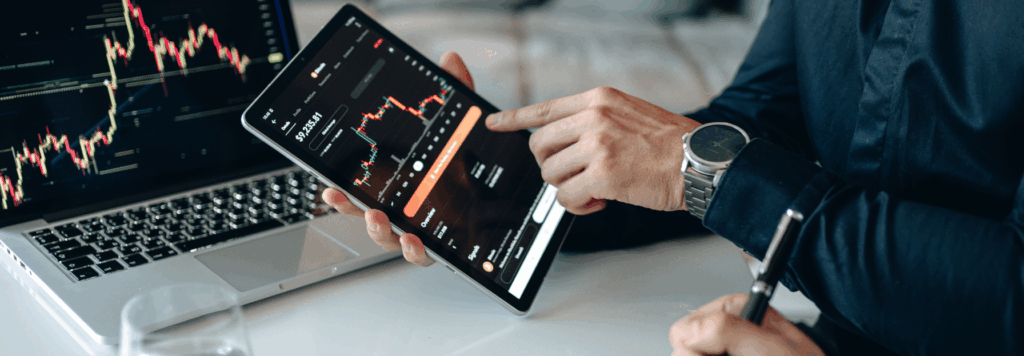 Man on Tablet Evaluating Data Results