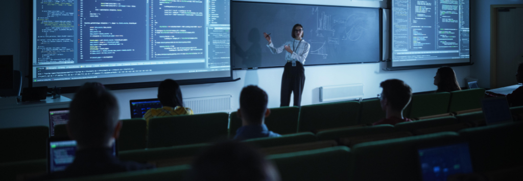 College professor teaching a classroom | Rea